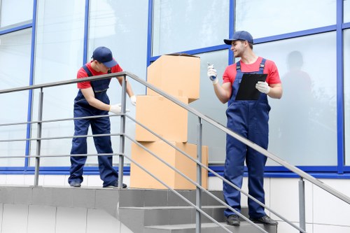 Front view of a man and van ready for work with safety markings