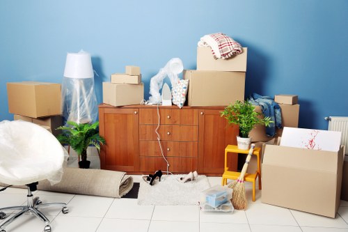 Movers assisting with office furniture setup