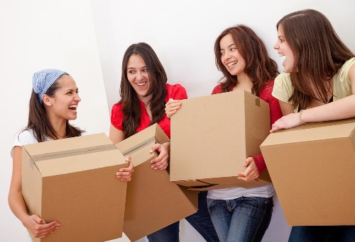Professional movers handling furniture