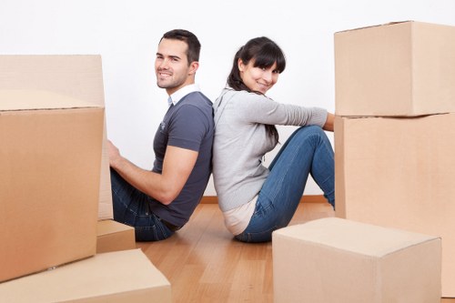 Professional movers loading a man van truck